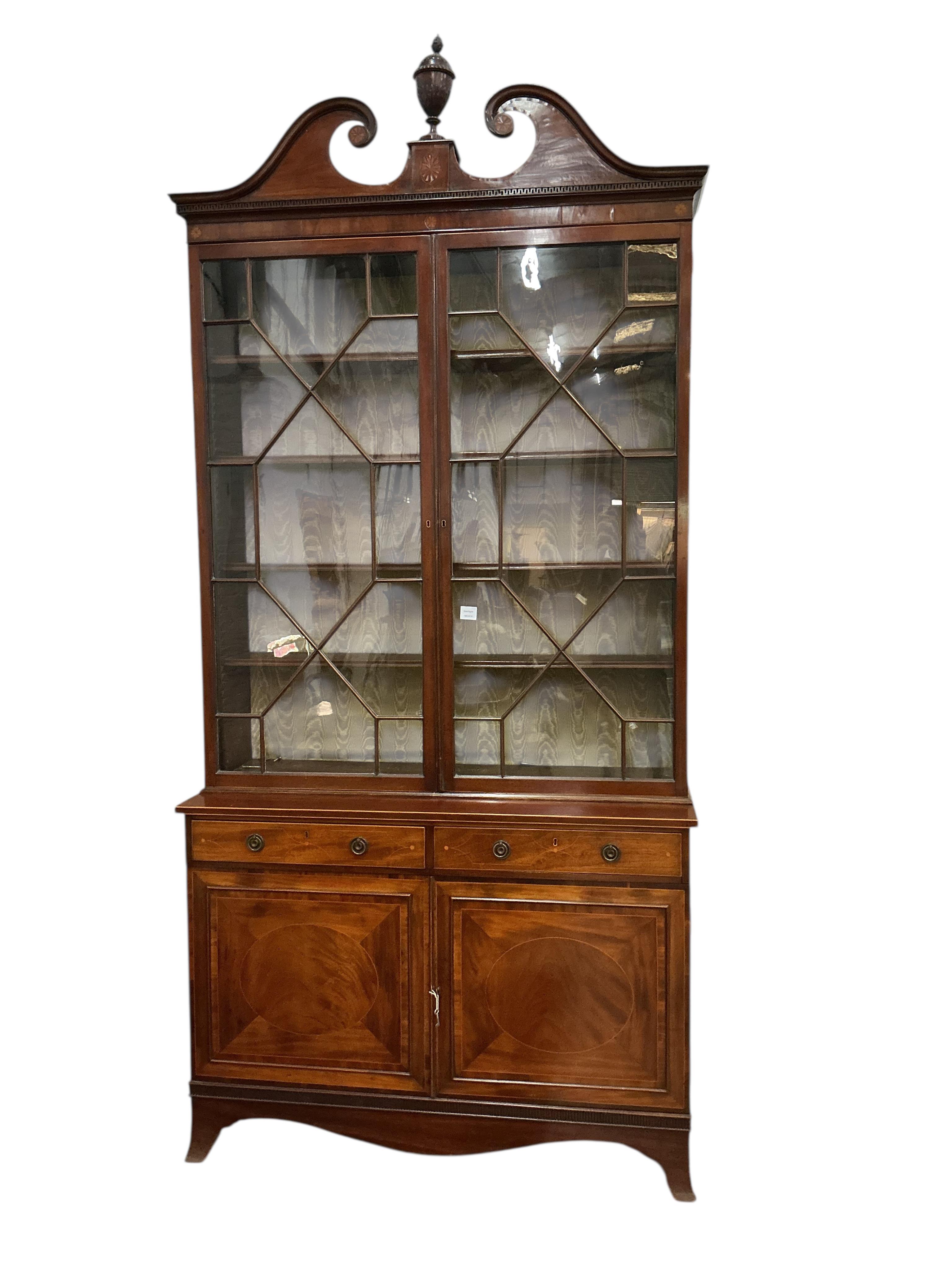 A George III and later inlaid mahogany library bookcase, width 130cm, depth 46cm, height 270cm